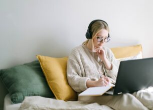 Girl Studying on Bed