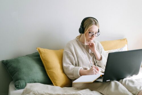 Girl Studying on Bed